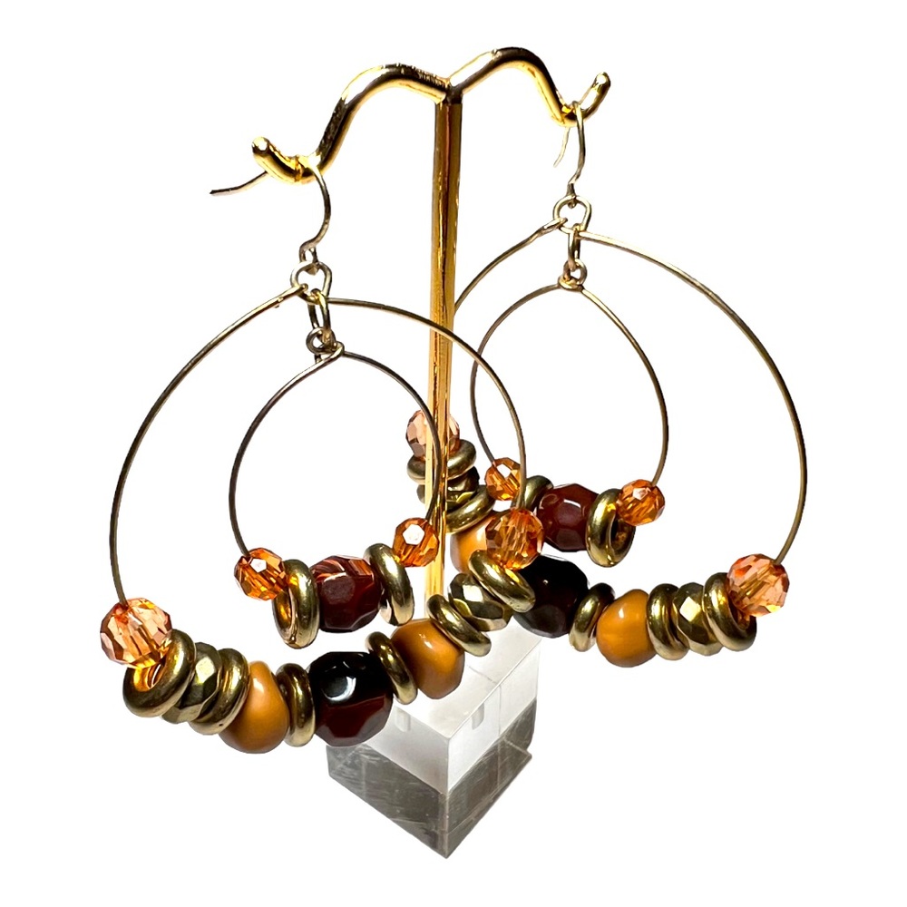 Tan and gold toned beaded hoop earrings
